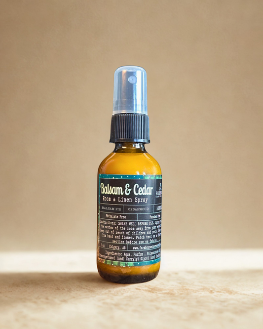 Balsam & Cedar Room & Linen Spray by Farmhouse Charm Candles on a beige background