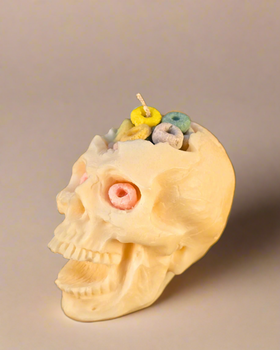 Cereal Killer Skull Candle – soy wax skull-shaped pillar candle with fruity cereal scent, eco-friendly and perfect for Halloween décor. Farmhouse Charm Candles