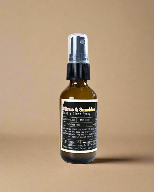 Instantly refresh your space with the uplifting scent of Blood Orange, Goji Berry, and Sandalwood. One spritz fills the air with bright citrus energy and a warm, grounding finish — like bottling up sunshine and happy memories. Perfect for adding a burst of joy to any room, any time. Citrus_SunshineRoom_LinenSpray-www.farmhousecharmcandles.com