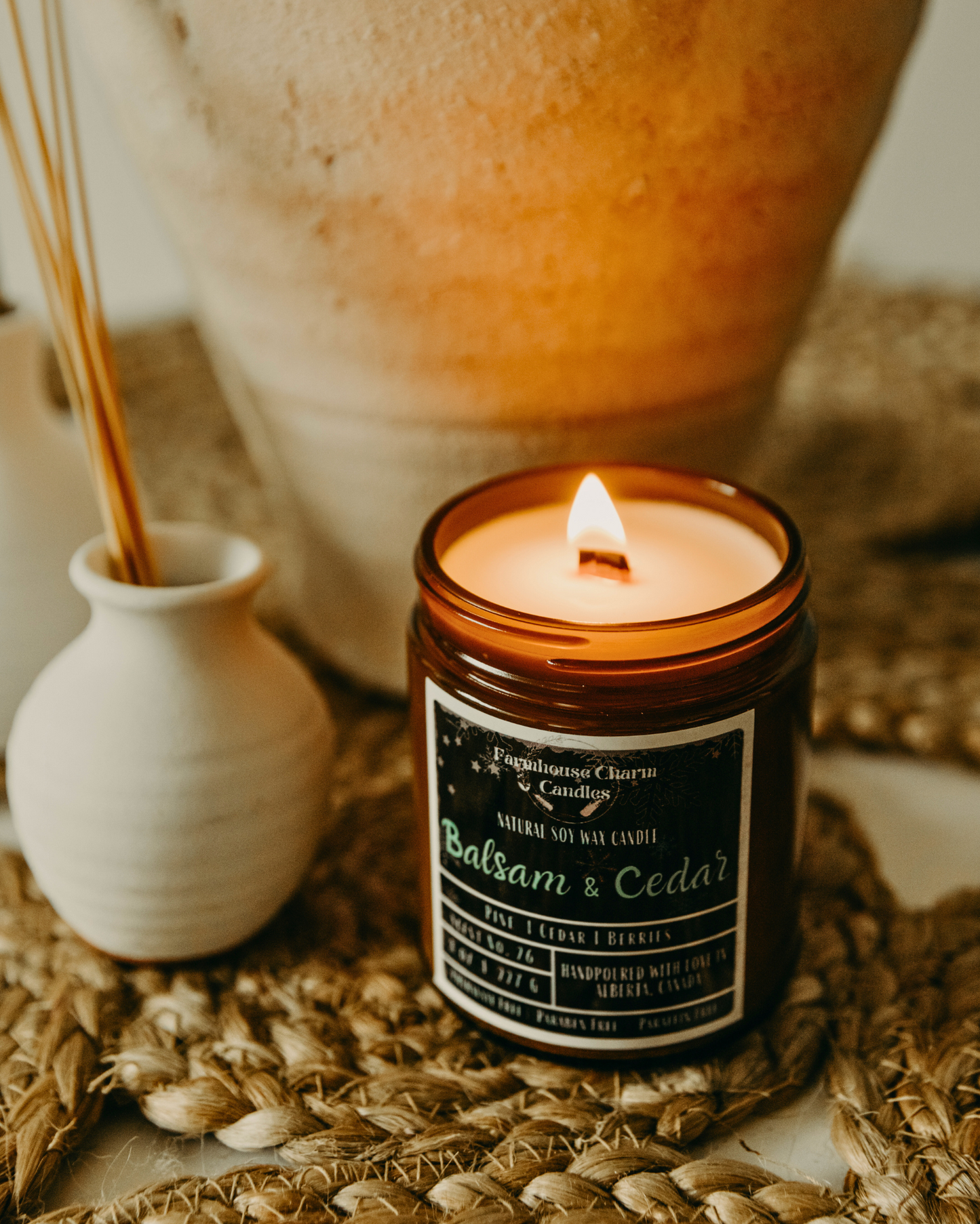 Experience the Joy of the Holidays with Balsam & Cedar Soy Candle. It's scent is a combination of balsam, cedar, and juniper berry, which together create a warm and inviting fragrance. The woody aroma adds texture to the wonderful forest scent, creating the perfect ambiance for the holiday season! www.farmhousecharmcandles.com