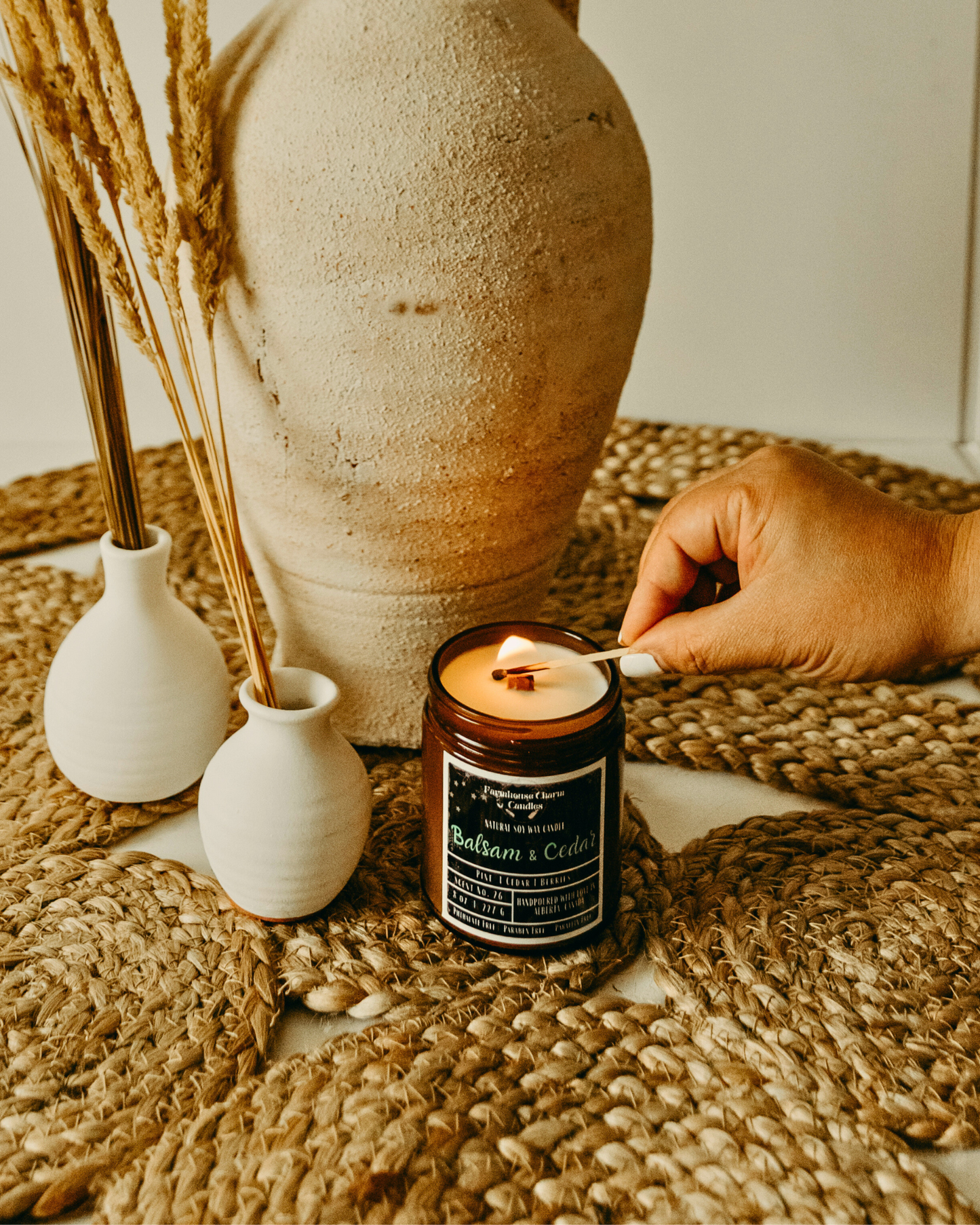 Experience the Joy of the Holidays with Balsam & Cedar Soy Candle. It's scent is a combination of balsam, cedar, and juniper berry, which together create a warm and inviting fragrance. The woody aroma adds texture to the wonderful forest scent, creating the perfect ambiance for the holiday season! www.farmhousecharmcandles.com