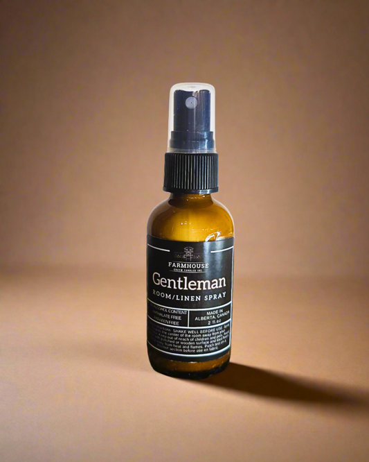 Get ready to ignite your senses with the smooth and irresistible Gentleman Room and Linen Spray. With the powerful blend of dark oak, bergamot, and a dash of bourbon, this candle embodies the essence of a true gentleman. Picture the rich aroma of dark oak, bringing the wilderness right into your living room, while the lively bergamot adds a burst of citrus freshness. And that subtle whisper of bourbon? It's like a nostalgic embrace, wrapping you in warmth and sophistication.