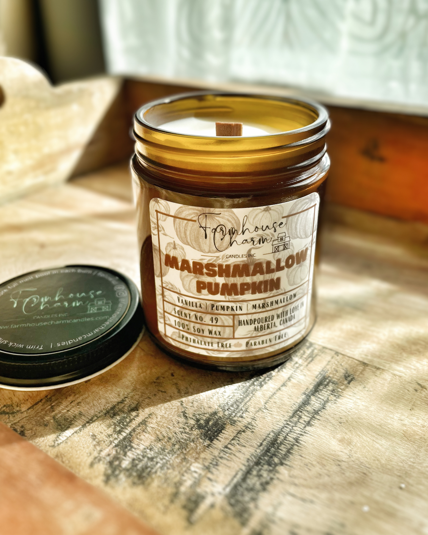 Marshmallow Pumpkin Soy Candle by Farmhouse Charm is a perfect addition to any home. The unique fragrance combines the sweet and comforting scents of vanilla, marshmallow, and pumpkin. The sweet and comforting scent of these candles creates a cozy atmosphere that is perfect for relaxing and unwinding after a long day.