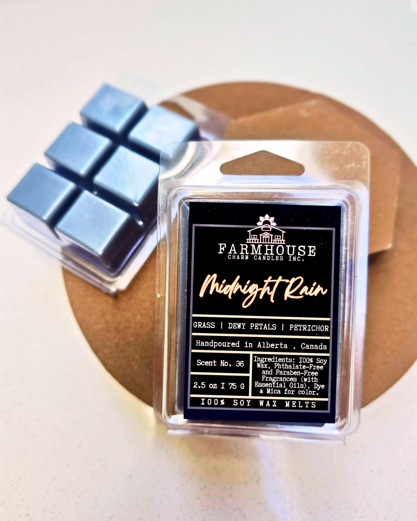 Experience nature’s clean slate with dewy grass, soft florals, and that unmistakable, soothing petrichor—the scent of rain on warm earth. Crisp. Grounding. Refreshing. Midnight Rain Soy Wax Melts - Farmhouse Charm Candles