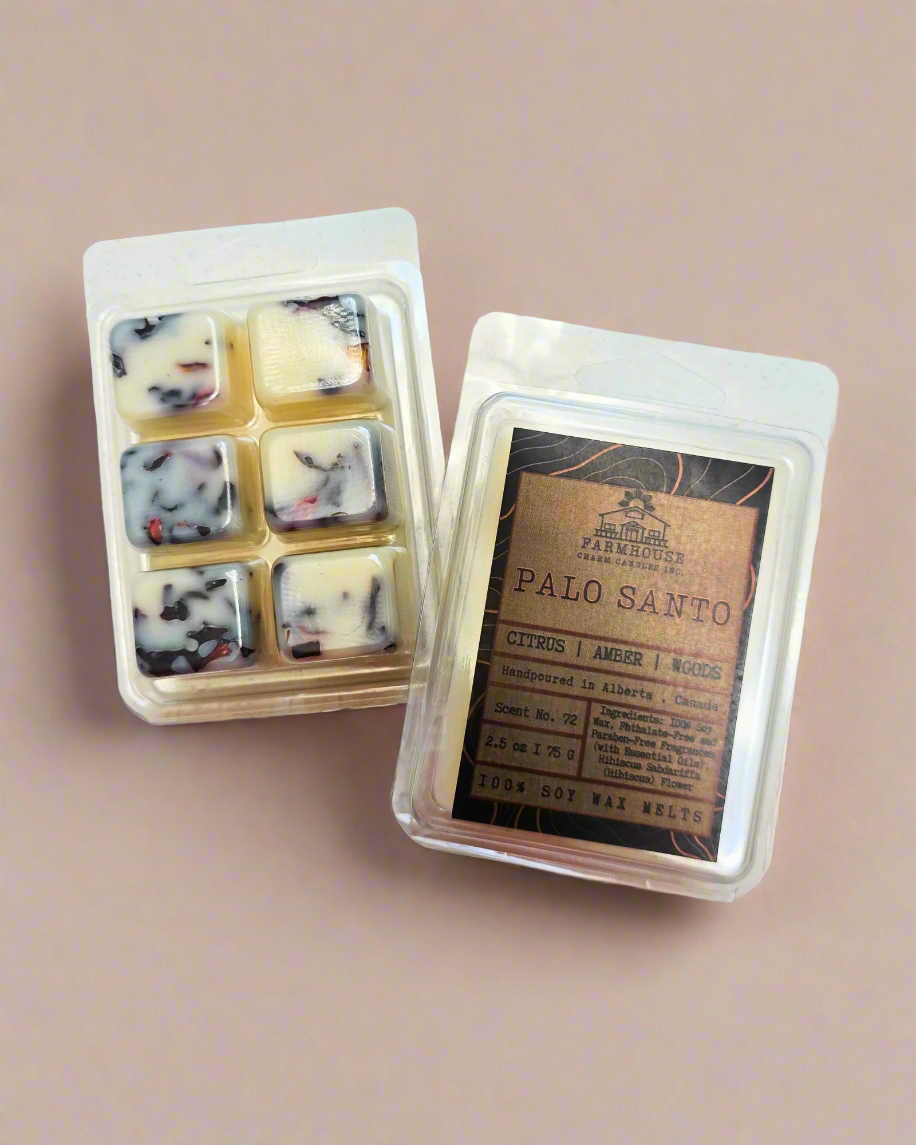 A blend of citrus, warm amber, and grounding woods, crafted to cleanse energy and invite tranquility. Perfect for resetting your space with a soothing, earthy aroma.
*Infused with real hibiscus flowers
Palo Santo Soy Wax Melts -Farmhouse Charm Candles
