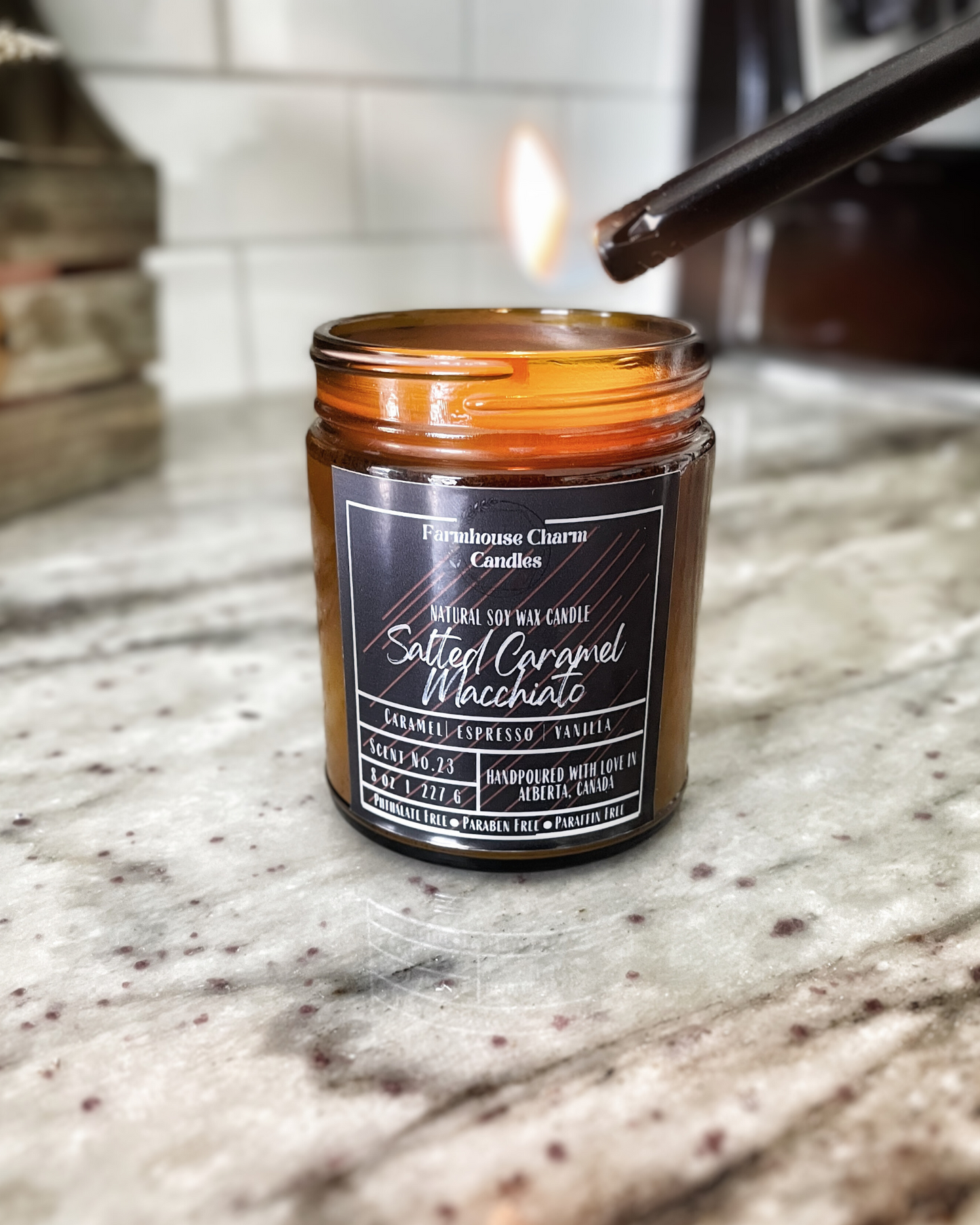 Savor the autumn season with a cozy sweater and a warm Salted Caramel Macchiato Soy Candle. For all the coffee lovers out there, the Salted Caramel Macchiato Soy Candle by Farmhouse Charm is the perfect addition to your fall routine. Infused with warm and rich aromas, this candle features a top note of caramelized sugar blended with roasted espresso, vanilla, salt, and spicy cinnamon.