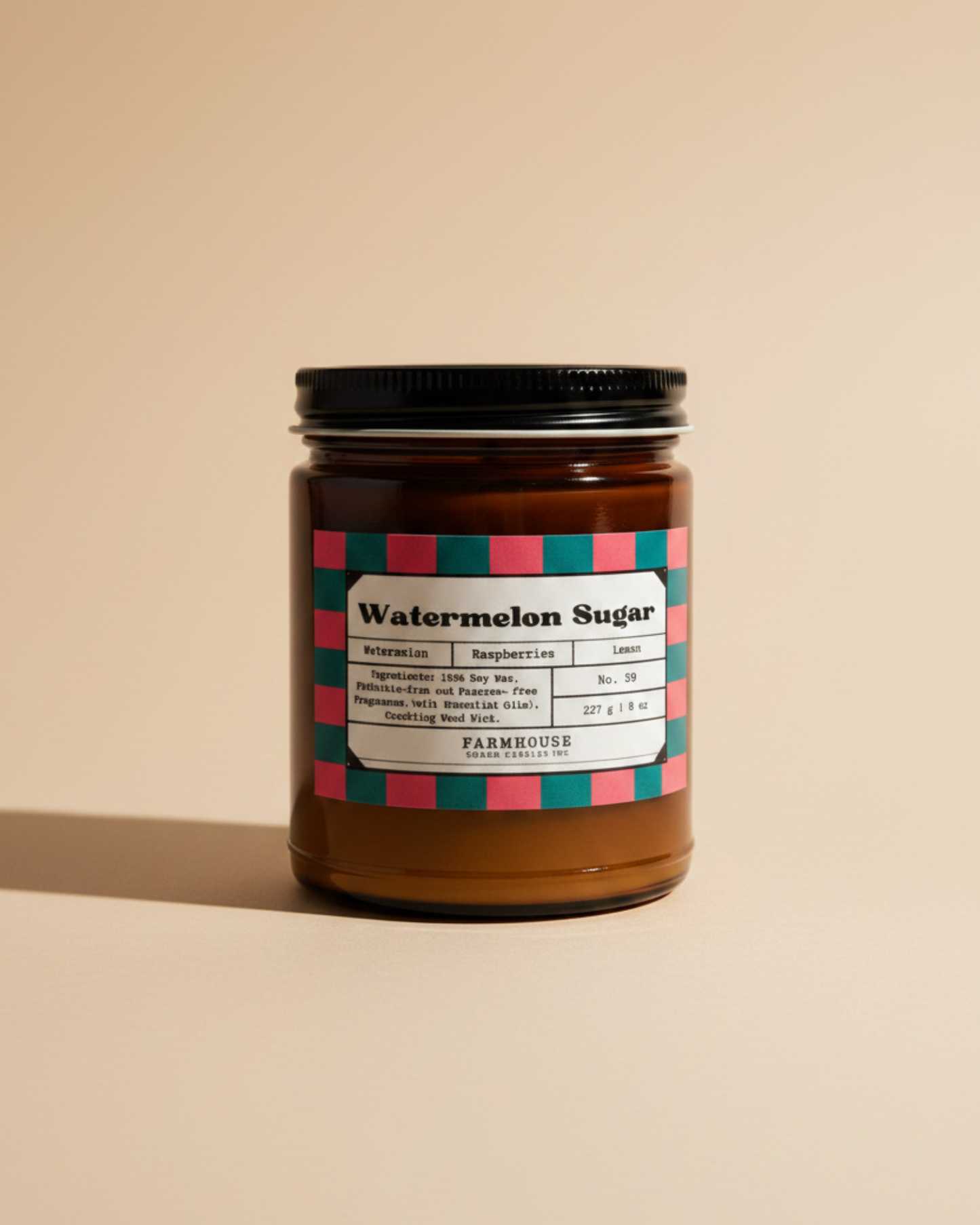 Jar of 'Watermelon Sugar' soy candle by Farmhouse Charm Candles with a colorful label on a white background