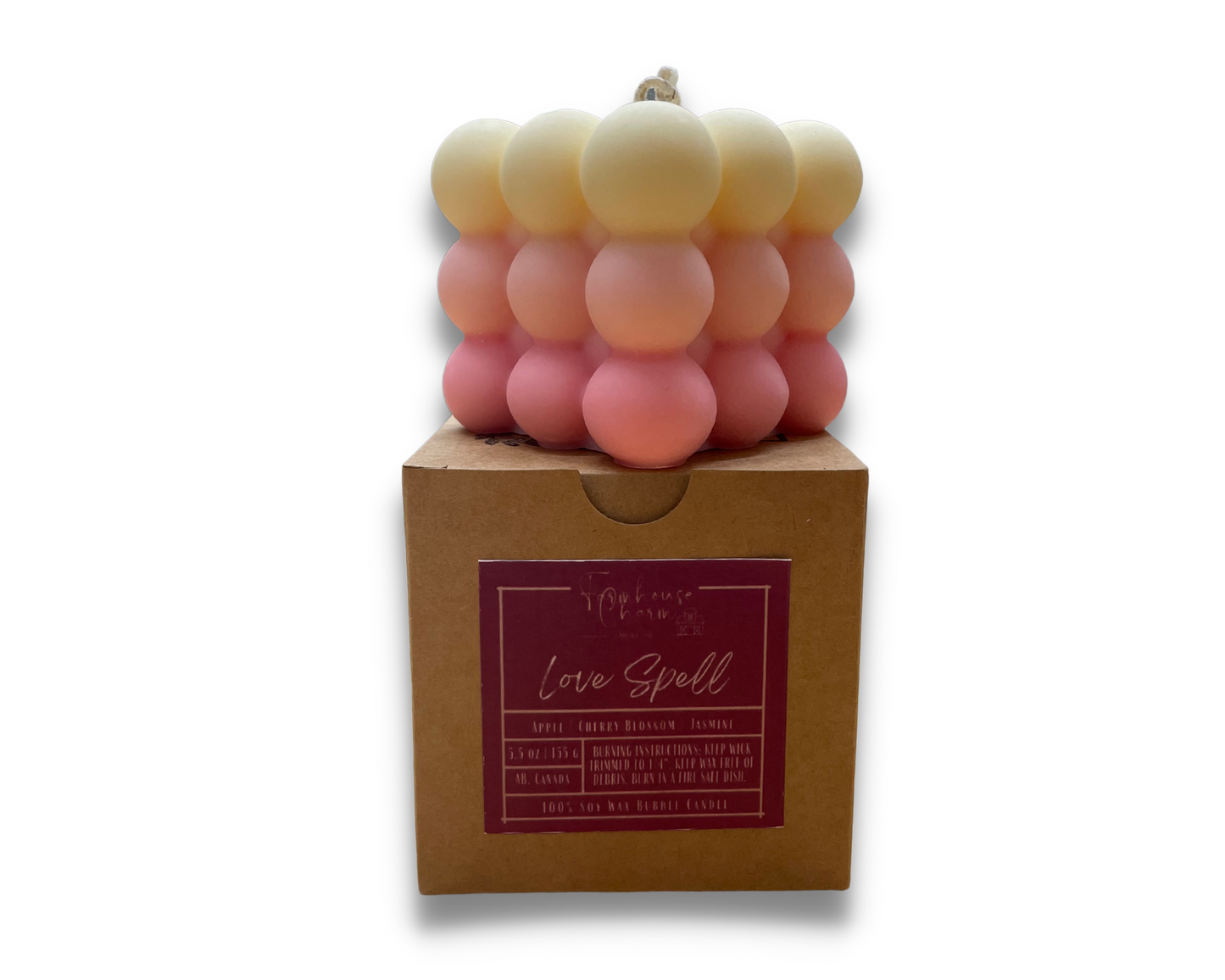 Fell in love with this candle. Love Spell Bubble Soy Candle- Farmhouse Charm is a sweet bouquet of orange, bergamot, cherry blossom and white jasmine with hint of peach and berries on an undertone of musk. Love Spell Bubble Soy Candle- Farmhouse Charm is made with 100% natural soy wax which is biodegradable and sustainable. This candle uses cotton wick. Fragrance is guaranteed to be paraben free and phthalate free. It has pink ombre color.