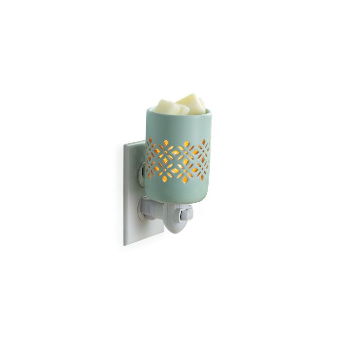 A precision cut pattern allows the light to be the focal point of a soft matte finish in a refreshing mint glaze. Pluggable Fragrance Warmers can be used in both vertical and horizontal outlets by twisting the plug base, making them ideal above counter outlets in small rooms and spaces. Suggested Use: Simply add wax melts to the dish, turn it on, and enjoy your favorite fragrance as it spreads through the room. This warmer works beautifully with 100% Soy Wax Melts by Farmhouse Charm Candles Inc