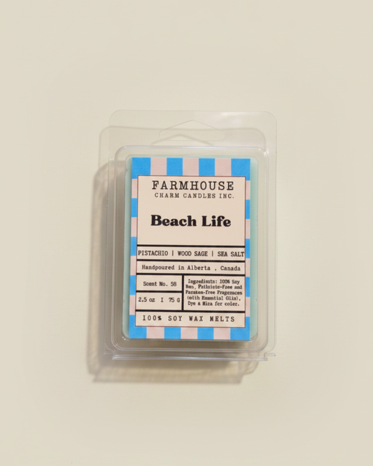Farmhouse Charm Candles Beach Life wax melt packaging on a beige background