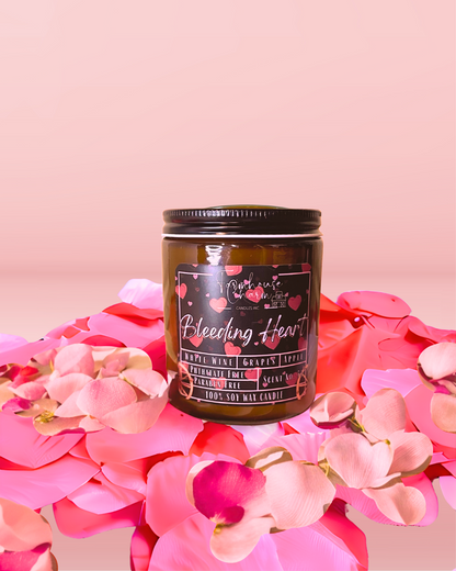 Get ready to swoon over Bleeding Heart Soy Candle. This one-of-a-kind scent is a delightful mix of Pinot Grigio wine, juicy grapes, crisp apples, with a citrusy zing to round it off. The Pinot Grigio gives it an elegant touch, while the fruity goodness of grapes and apple balance it out. Plus, the red heart toppings that appear to bleed make it a perfect Valentine's Day gift for your nose! www.farmhousecharmcandles.com