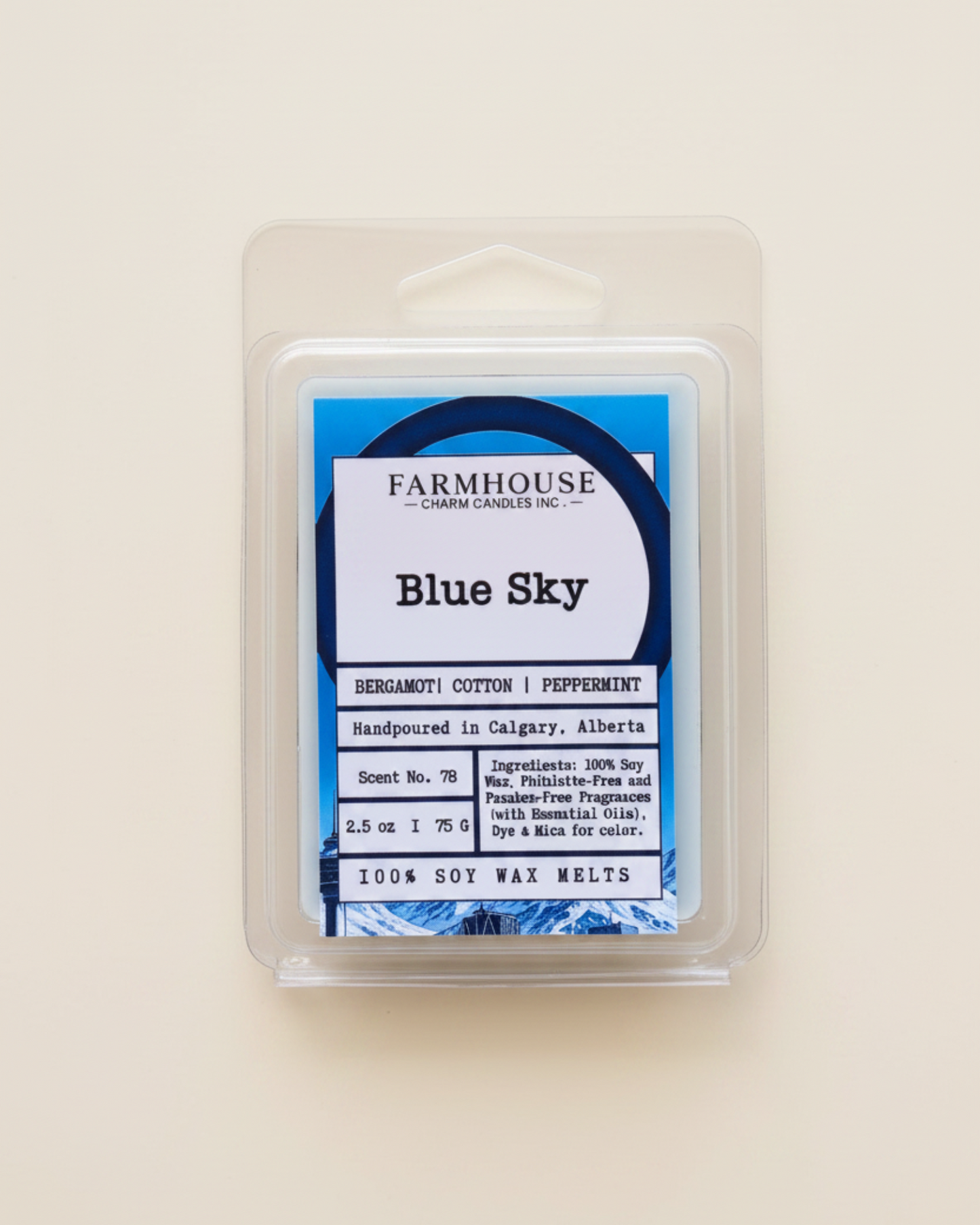 Wax melt package labeled 'Blue Sky' by Farmhouse Candles on a white background
