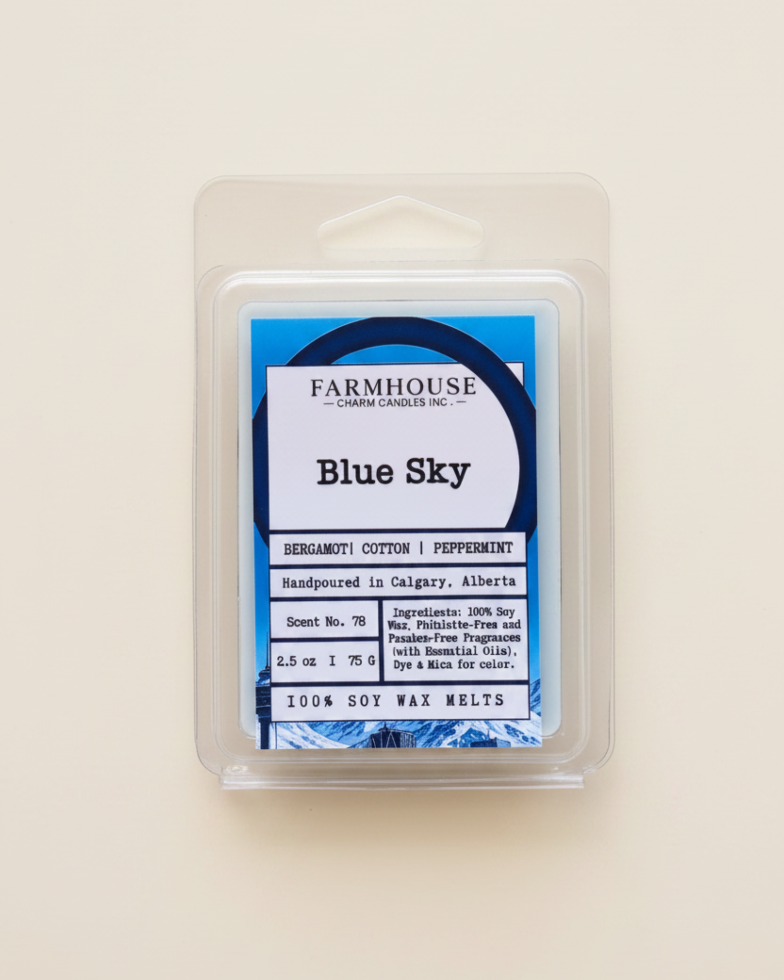 Wax melt package labeled 'Blue Sky' by Farmhouse Candles on a white background