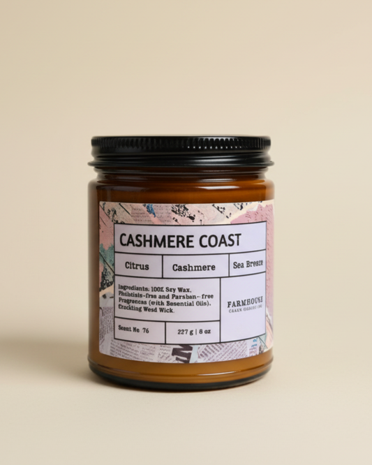 Candle jar labeled 'Cashmere Coast' on a beige background by_Farmhouse_Charm_candles