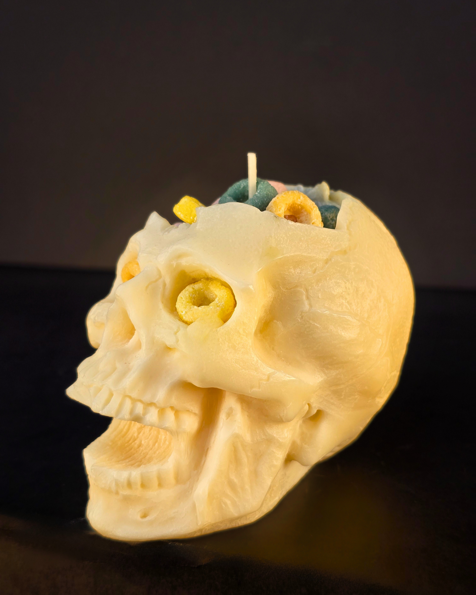 Cereal Killer Skull Candle – soy wax skull-shaped pillar candle with fruity cereal scent, eco-friendly and perfect for Halloween décor. Farmhouse Charm Candles