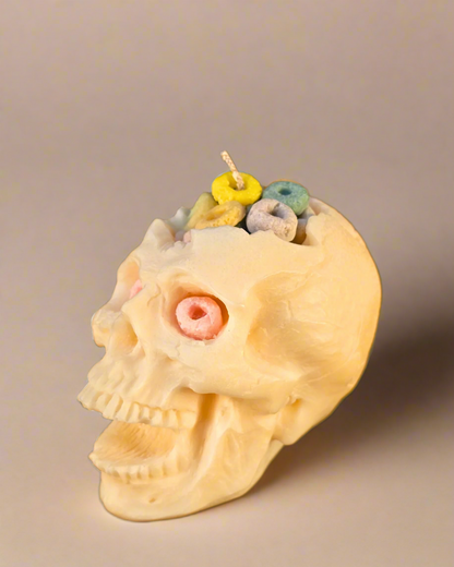 Cereal Killer Skull Candle – soy wax skull-shaped pillar candle with fruity cereal scent, eco-friendly and perfect for Halloween décor. Farmhouse Charm Candles