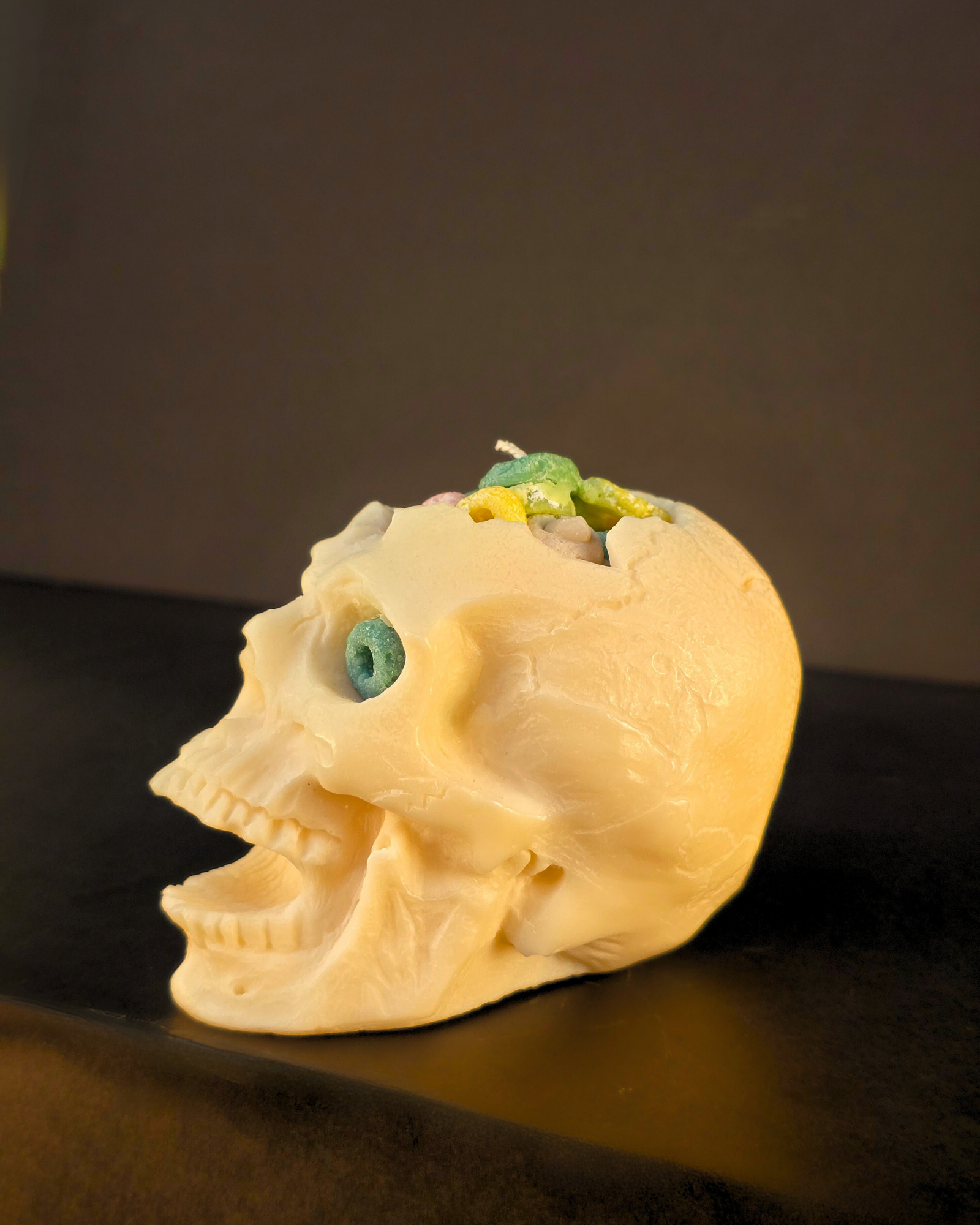 Cereal Killer Skull Candle – soy wax skull-shaped pillar candle with fruity cereal scent, eco-friendly and perfect for Halloween décor. Farmhouse Charm Candles