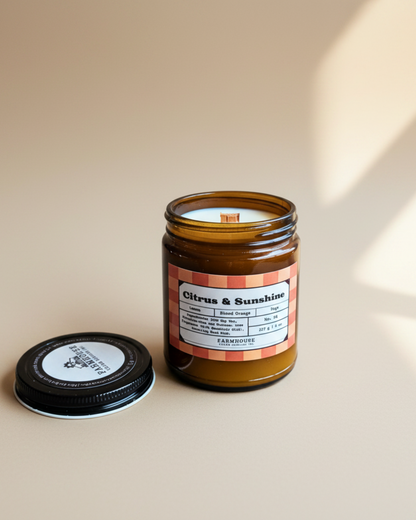 A bright burst of citrus with a soft herbal twist. Fresh lemon and juicy blood orange meet calming sage for a clean, sun-kissed scent that feels like summer at home. Citrus & Sunshine Soy Candle by Farmhouse Charm Candles