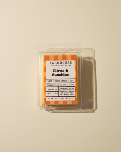 Farmhouse Charm Candles Citrus & Sunshine Wax Melts  blends zesty lemon and juicy blood orange with a soft touch of sage for a fresh, uplifting scent that feels like warm sunshine pouring through your windows. Clean, vibrant, and effortlessly refreshing — like summer at home.