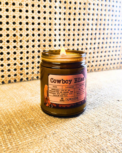 A bold blend of rugged leather, woodsy sage, and calming lavender. This masculine-meets-floral scent brings cozy vibes and western charm. Perfect for any cowboy or cowgirl lookin’ to unwind. www.farmhousecharmcandles.com