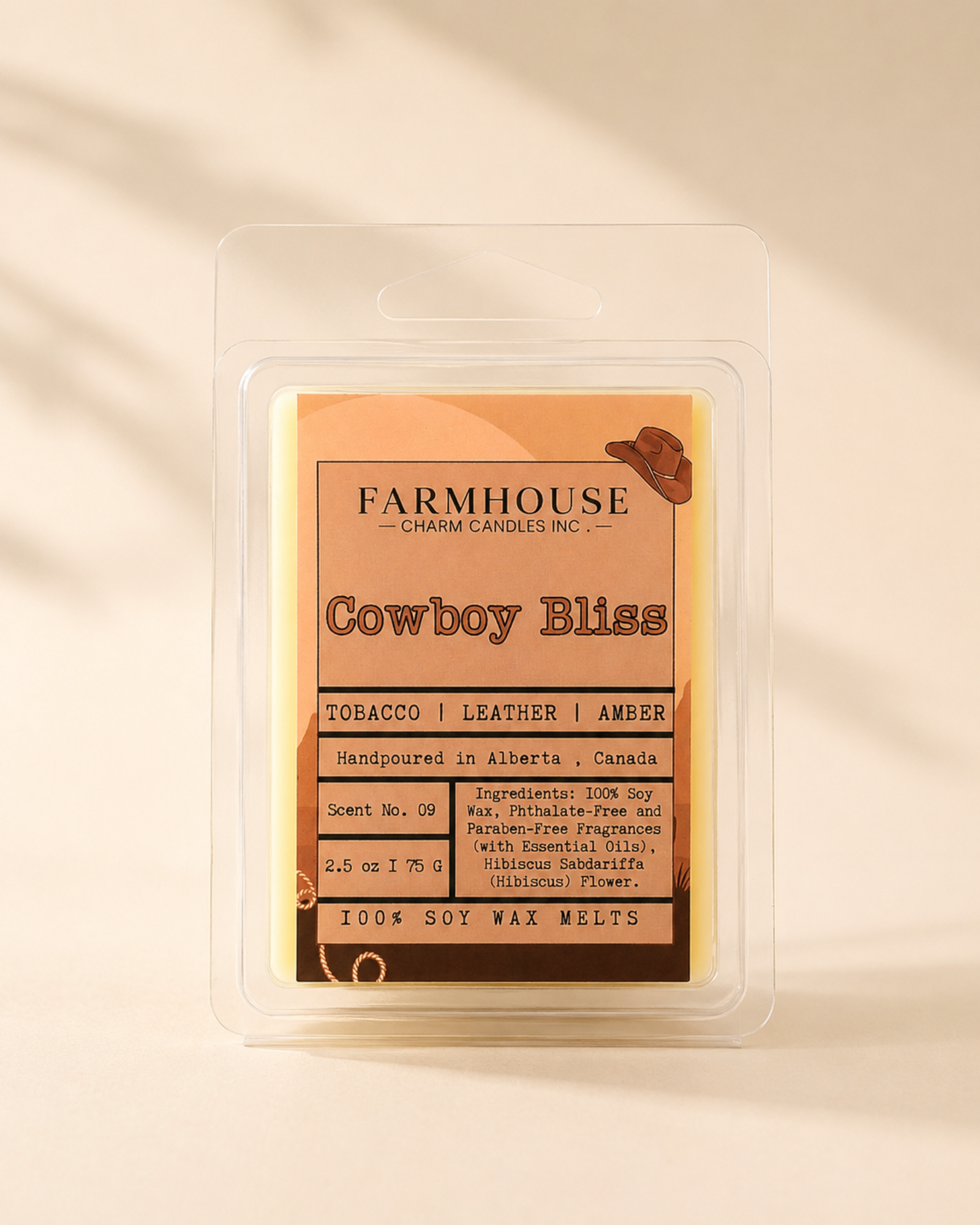 Front view of Cowboy Bliss soy wax melt clamshell with western-style label showing tobacco, leather and amber scent notes, handpoured in Alberta Canada — Farmhouse Charm Candles