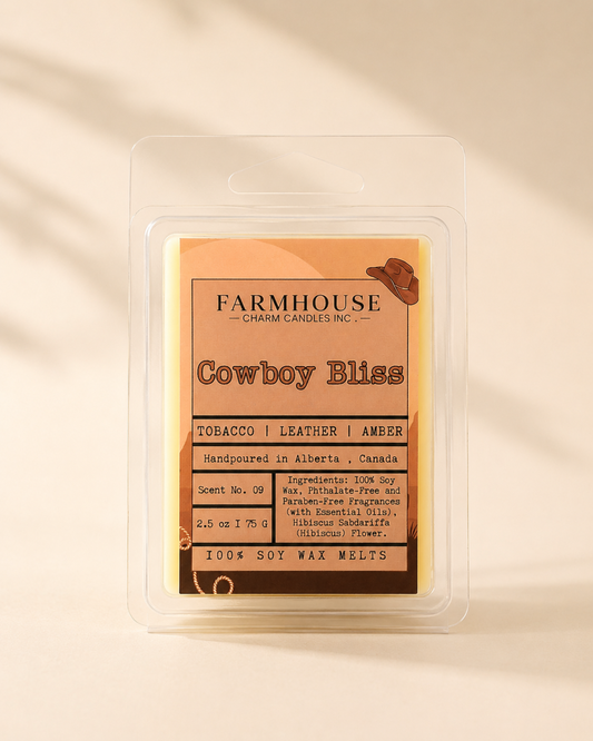 Front view of Cowboy Bliss soy wax melt clamshell with western-style label showing tobacco, leather and amber scent notes, handpoured in Alberta Canada — Farmhouse Charm Candles