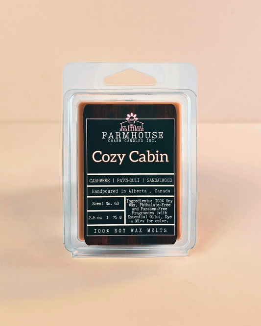 Farmhouse Charm CandlesCozy Cabin soy wax melt packaging on a beige background
