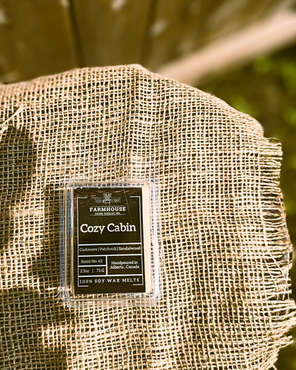 Experience the warmth and comfort of fall with our newly formulated Cozy Cabin Soy Wax Melts. Infused with rich notes of cashmere, patchouli, and sandalwood, this wax melts delivers a deep, rustic aroma that transforms any space into a cozy retreat. It’s more than just a scents – it’s an invitation to unwind and relax in the comforting embrace of farmhouse charm.