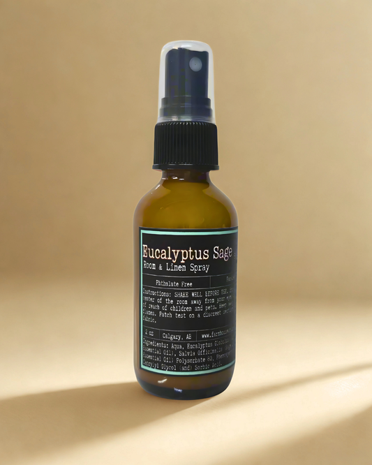 Eucalyptus Sage room and linen spray bottle on a beige background by Farmhouse Charm Candles