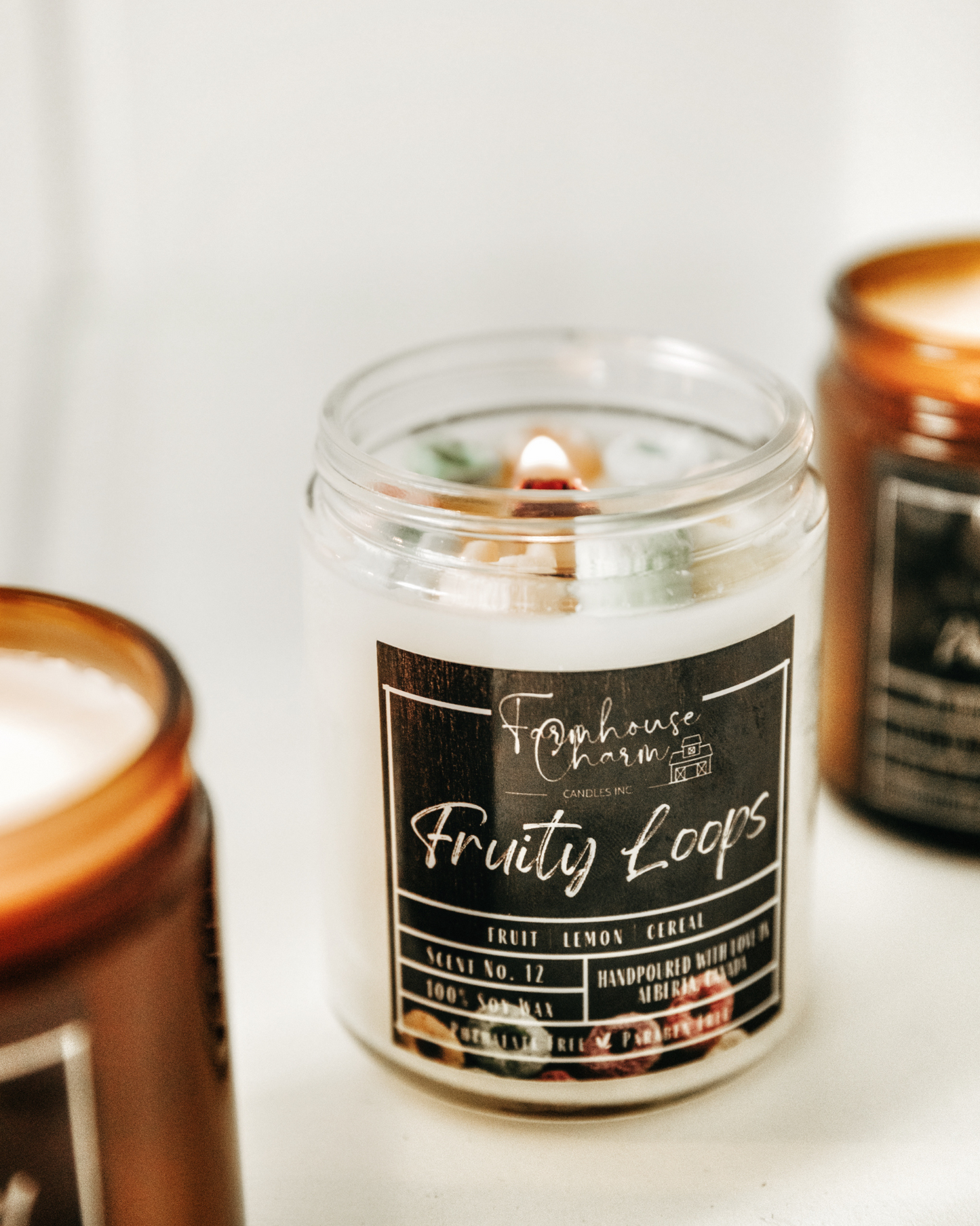 Indulge in the unique and nostalgic scent of Fruity Loops Soy Candle. This candle is bursting with a blend of sweet and tangy fruit, a hint of lemon, and the warm toasty aroma of cereal. Get ready to relive some of your fondest childhood memories! Please note that decors on top may vary slightly from the photo due to the handmade nature of the candle. www.farmhousecharmcandles.com