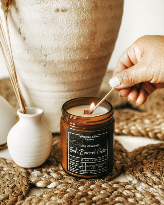 As the leaves start to fall and the temperatures drop, it's time to embrace the cozy and comforting scents of the season. The Oak Barrel Cider Soy Candle by Farmhouse Charm is the perfect way to do just that. The warm blend of classic apple cider, mulled fruit and cinnamon creates a truly inviting aroma that will fill any room with its comforting scent. The hint of oak adds a touch of sophistication to the scent, making it perfect for any setting.