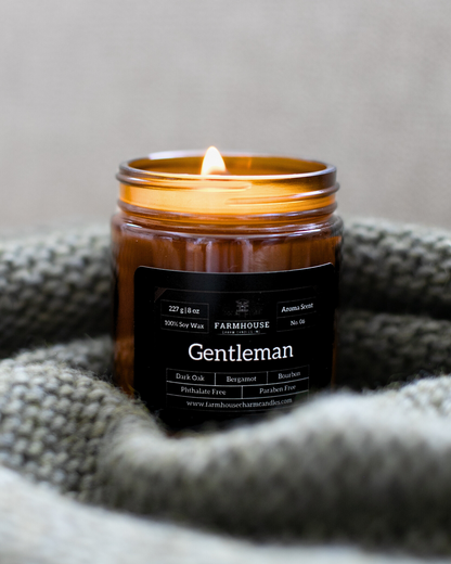 Meet Gentleman—a scent that’s as smooth as a well-aged bourbon and as refined as a tailored suit. Notes of rich dark oak, zesty bergamot, and a warm bourbon finish create an irresistibly dapper aroma that feels like a cozy fireside chat in your favorite leather chair.
www.farmhousecharmcandles.com