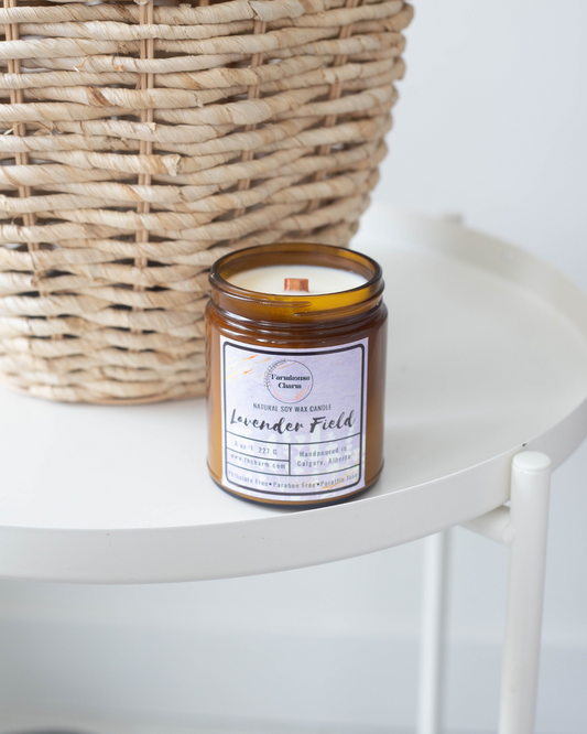 Introducing Our Latest Classic Scent – The Lavender Field - Farmhouse Charm Soy Candle.  Indulge in our new lavender blend, which features the delicate scent of French Lavender with exotic amber, tonka beans, and musk. This rich and warm bouquet is perfect for bringing coziness to your home and helping you unwind after a long day.  Our Lavender Field - Farmhouse Charm Soy Candle is a perfect addition to any home. www.farmhousecharmcandles.com