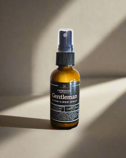Get ready to ignite your senses with the smooth and irresistible Gentleman Room and Linen Spray. With the powerful blend of dark oak, bergamot, and a dash of bourbon, this candle embodies the essence of a true gentleman.  Picture the rich aroma of dark oak, bringing the wilderness right into your living room, while the lively bergamot adds a burst of citrus freshness. And that subtle whisper of bourbon? It's like a nostalgic embrace, wrapping you in warmth and sophistication.