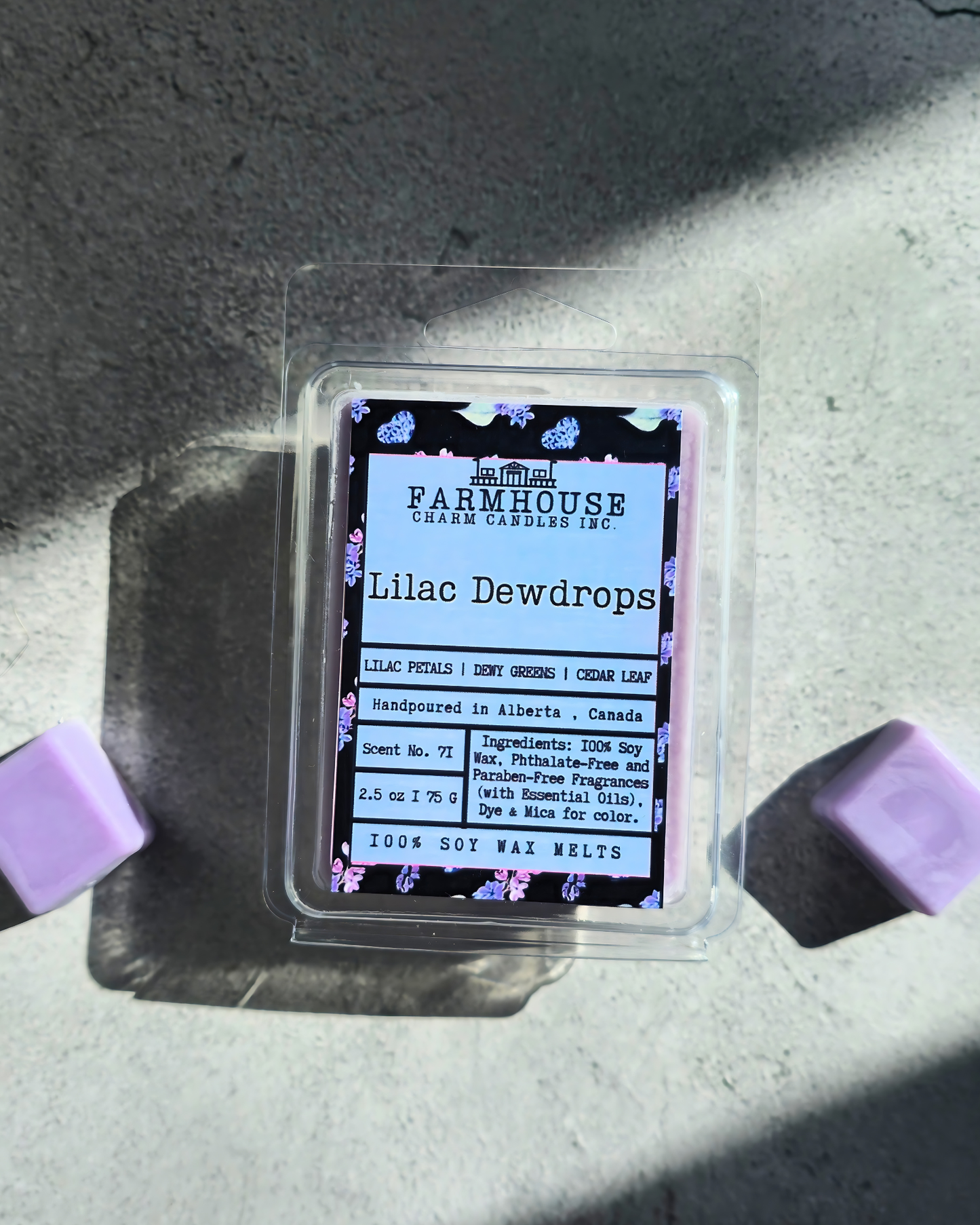 A fresh and elegant floral fragrance featuring blooming lilac petals, crisp dewy green leaves, and a soft touch of cedar leaf for a gentle woodsy finish. This scent captures the feeling of lilacs in full spring bloom—clean, airy, and beautifully inviting, bringing the freshness of a spring garden into your home. Lilac Dewdrops Soy Wax Melts - Farmhouse Charm Candles