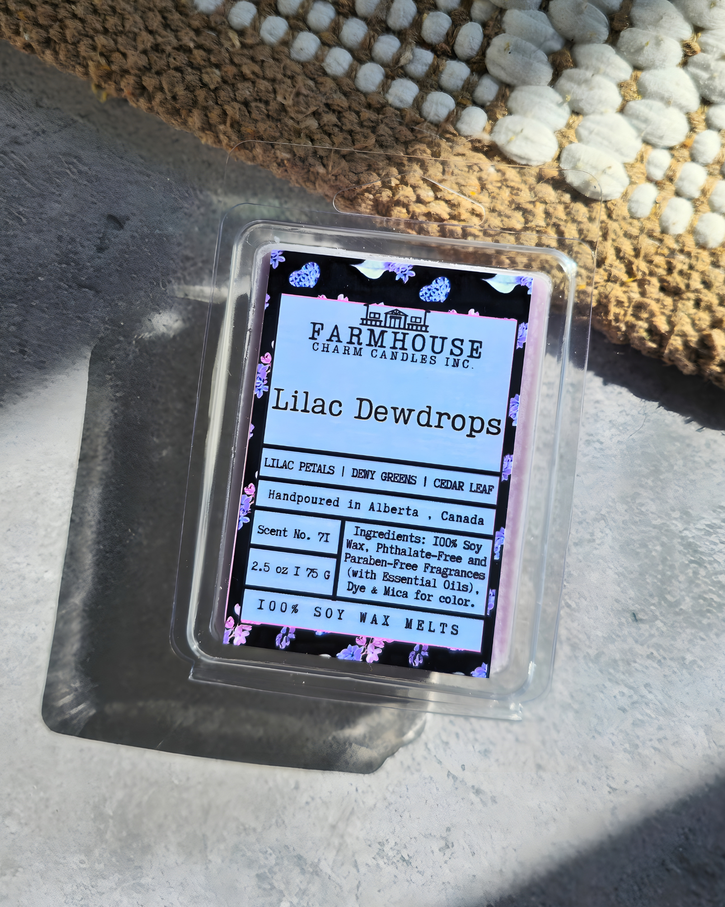 A fresh and elegant floral fragrance featuring blooming lilac petals, crisp dewy green leaves, and a soft touch of cedar leaf for a gentle woodsy finish. This scent captures the feeling of lilacs in full spring bloom—clean, airy, and beautifully inviting, bringing the freshness of a spring garden into your home. Lilac Dewdrops Soy Wax Melts - Farmhouse Charm Candles