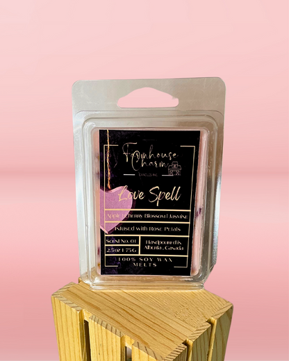 Let's reignite your passion for this classic aroma! Our Love Spell Soy Wax Melts boast an enchanting mix of zesty oranges, fragrant bergamot, sweet cherry blossom, and fresh white jasmine. Plus a hint of peach and berries on a musky base will sweep you off your feet. Our Love Spell Soy Wax Melts are not only captivating but also infused with rose petals to make it extra special. Get ready to be spellbound! www.farmhousecharmcandles.com