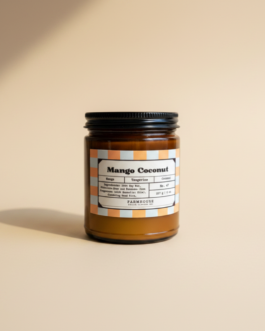 Mango Coconut candle jar with label on a white background by 
Farmhouse Charm Candles