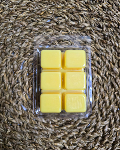 Step into a world of tropical bliss with our Mango Coconut Soy Wax Melts. Crafted to whisk you away to warm summer days, this candle infuses your space with the luscious aroma of ripe mangoes and creamy coconut milk, accented by hints of bright citrus and musky undertones. This wax melts will transport you to sun-drenched shores and lazy summer afternoons