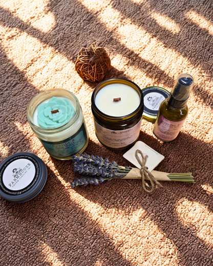 Mother's Day Gift Bundle www.farmhousecharmcandles.com. A thoughtfully curated set to show Mom just how much she means to you. Includes Orchid Sea Salt Soy Candle, Personalized Soy Candle, Lavender Mist Room & Linen Spray, Mini Lavender Bouquet