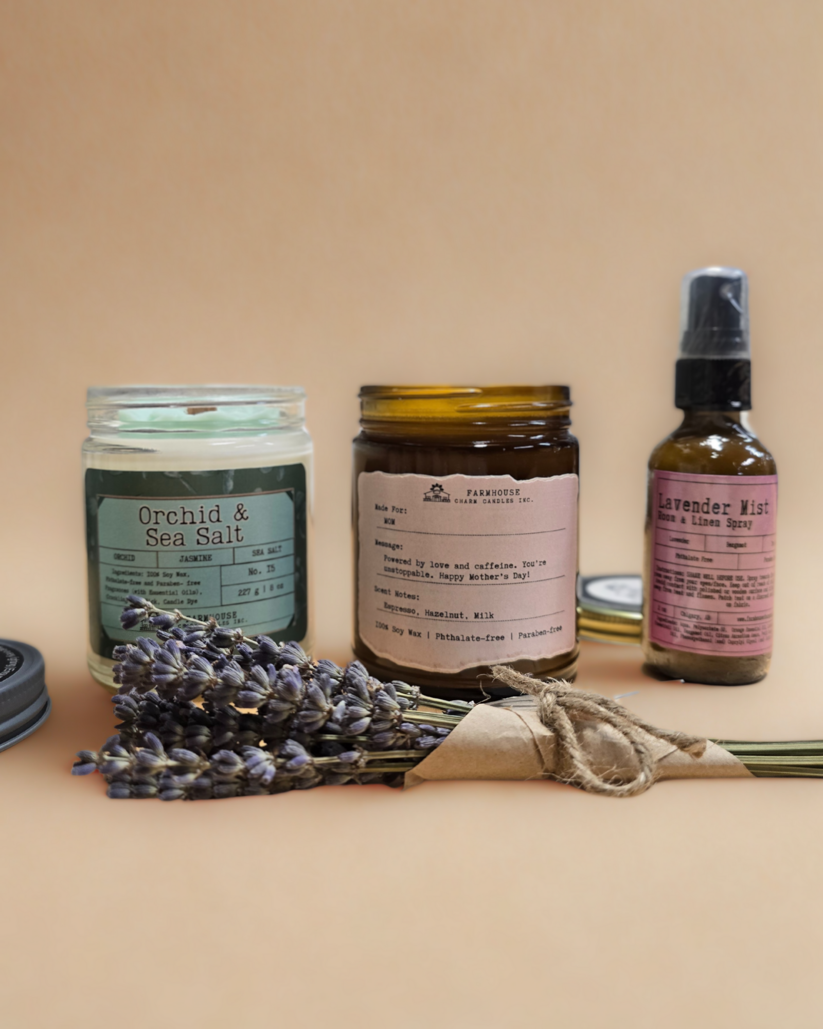 Mother's Day Gift Bundle www.farmhousecharmcandles.com. A thoughtfully curated set to show Mom just how much she means to you. Includes Orchid Sea Salt Soy Candle, Personalized Soy Candle, Lavender Mist Room & Linen Spray, Mini Lavender Bouquet