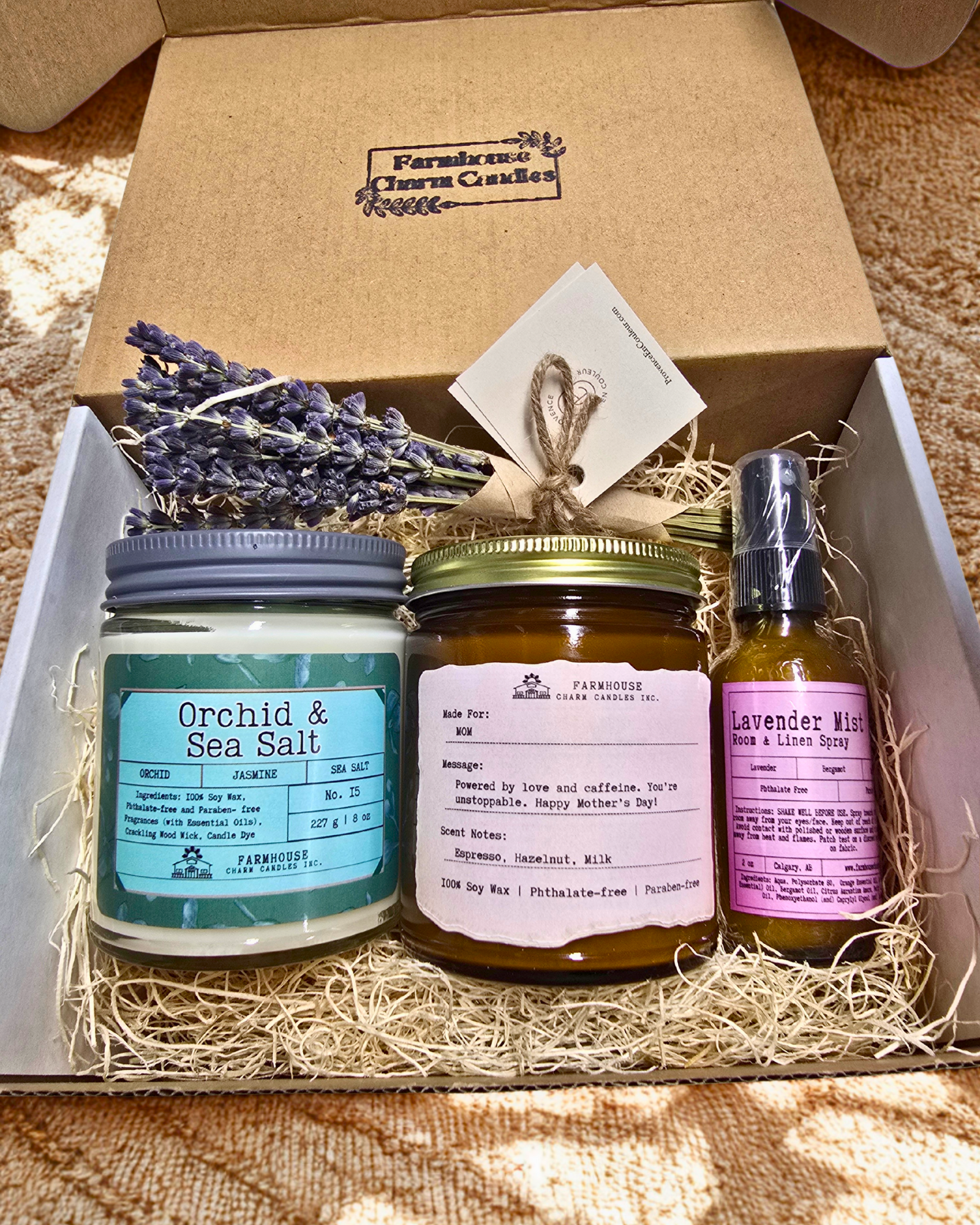 Mother's Day Gift Bundle www.farmhousecharmcandles.com. A thoughtfully curated set to show Mom just how much she means to you. Includes Orchid Sea Salt Soy Candle, Personalized Soy Candle, Lavender Mist Room & Linen Spray, Mini Lavender Bouquet