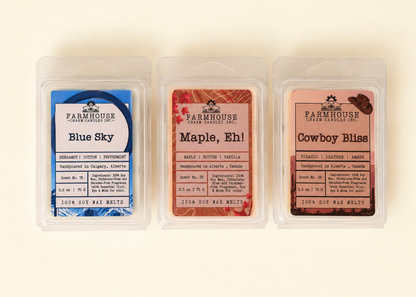 Oh Canada Wax Melts Bundle showing three Farmhouse Charm Candles clamshells side by side — Blue Sky, Maple Eh and Cowboy Bliss — 100% soy wax melts handpoured in Alberta Canada