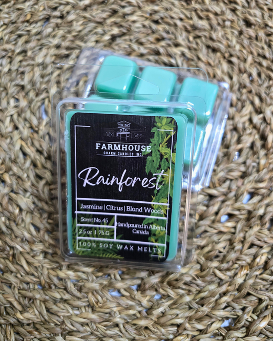 Step into a world of nostalgia with our Rainforest Soy Wax Melts. This delightful blend captures the essence of wandering through a lush rainforest, evoking memories of carefree adventures and hidden wonders. Picture yourself wandering through a verdant rainforest, surrounded by the sweet fragrance of jasmine blossoms in full bloom. The zesty citrus notes add a touch of brightness to your adventure, while the comforting scent of blond woods wraps you in a cozy embrace, like an old friend.