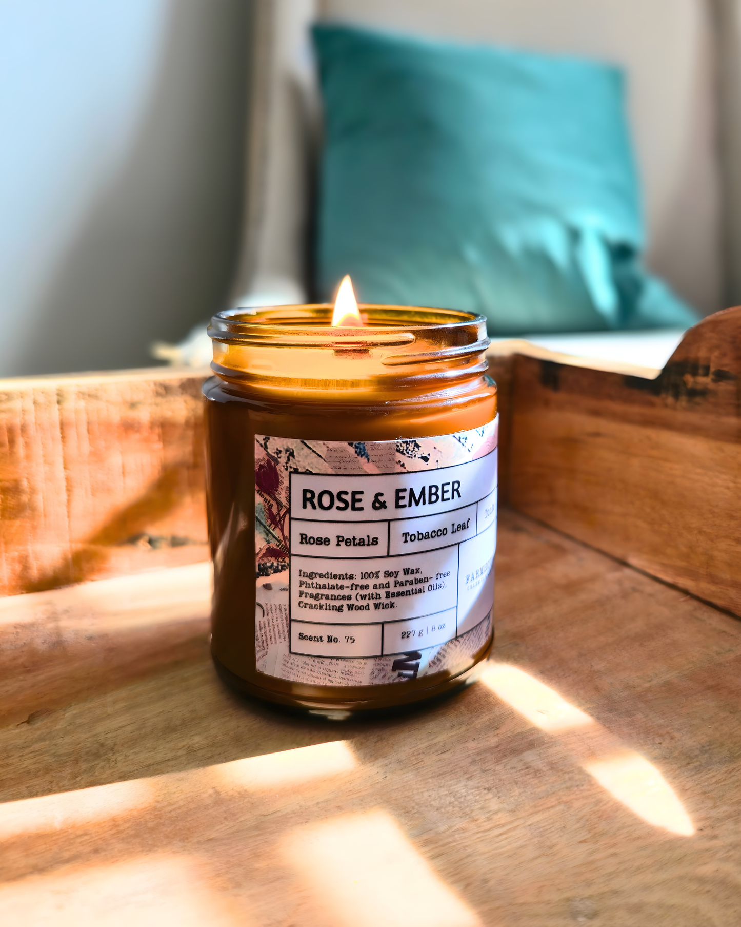 Candle labeled 'Rose & Ember' in a wooden box with a blurred background by_Farmhouse_Charm_candles