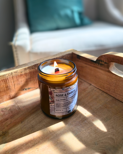 Candle in a glass jar labeled 'Rose & Ember' on a wooden tray by_Farmhouse_Charm_candles