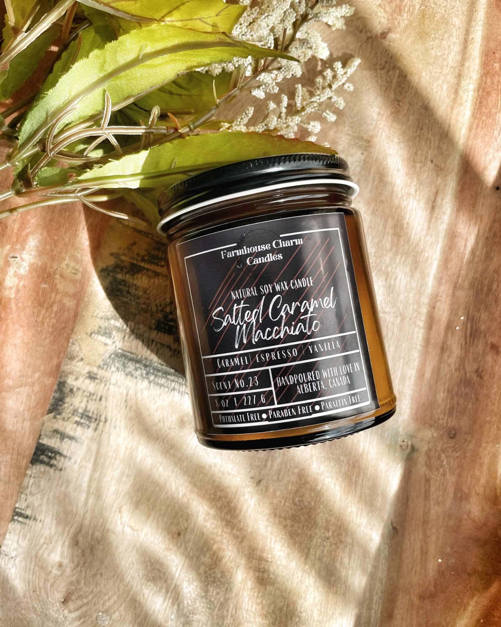 Savor the autumn season with a cozy sweater and a warm Salted Caramel Macchiato Soy Candle. For all the coffee lovers out there, the Salted Caramel Macchiato Soy Candle by Farmhouse Charm is the perfect addition to your fall routine. Infused with warm and rich aromas, this candle features a top note of caramelized sugar blended with roasted espresso, vanilla, salt, and spicy cinnamon.