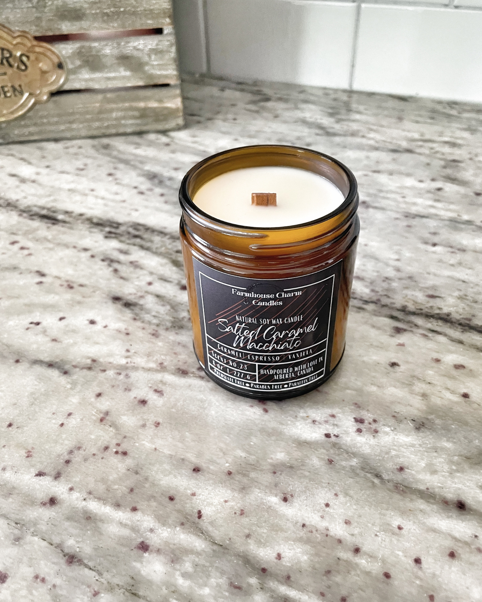 Savor the autumn season with a cozy sweater and a warm Salted Caramel Macchiato Soy Candle. For all the coffee lovers out there, the Salted Caramel Macchiato Soy Candle by Farmhouse Charm is the perfect addition to your fall routine. Infused with warm and rich aromas, this candle features a top note of caramelized sugar blended with roasted espresso, vanilla, salt, and spicy cinnamon.
