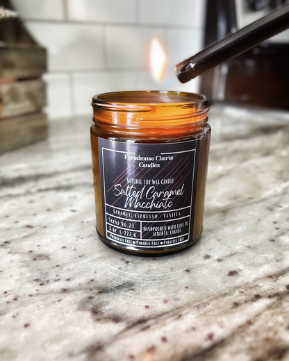 Savor the autumn season with a cozy sweater and a warm Salted Caramel Macchiato Soy Candle. For all the coffee lovers out there, the Salted Caramel Macchiato Soy Candle by Farmhouse Charm is the perfect addition to your fall routine. Infused with warm and rich aromas, this candle features a top note of caramelized sugar blended with roasted espresso, vanilla, salt, and spicy cinnamon.
