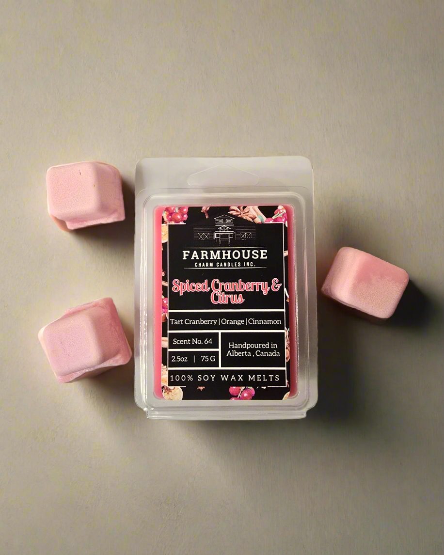 Bring the spirit of the festive season into your home with the irresistible scent of Spiced Cranberry &amp; Citrus Soy Wax Melts. This delightful blend of tart cranberry, zesty orange, and warm cinnamon creates an inviting atmosphere perfect for holiday gatherings or quiet winter nights.